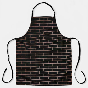 The dark black brick wall has a rough surface as a apron