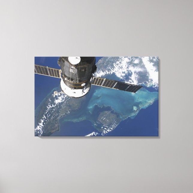 The docked Progress 22 spacecraft Canvas Print (Front)