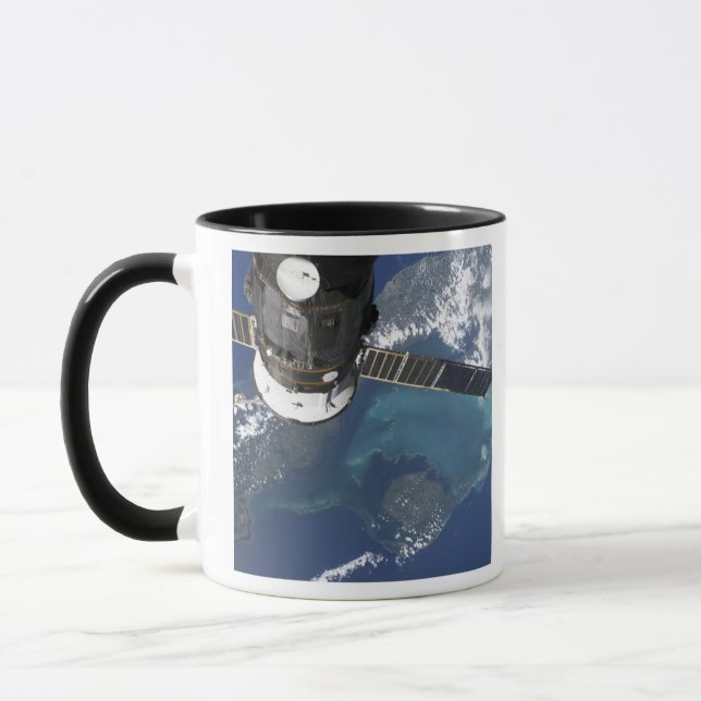 The docked Progress 22 spacecraft Mug (Left)