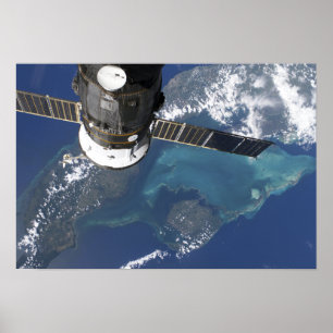 The docked Progress 22 spacecraft Poster