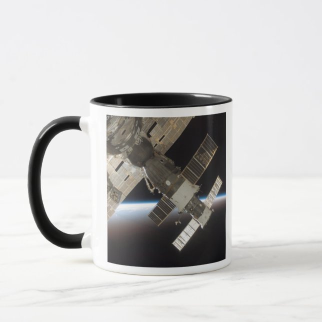 The docked Soyuz 13 Mug (Left)