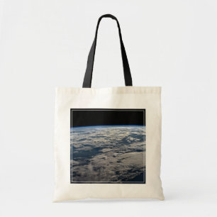The Earth's Limb Above A Cloudy Western Australia. Tote Bag