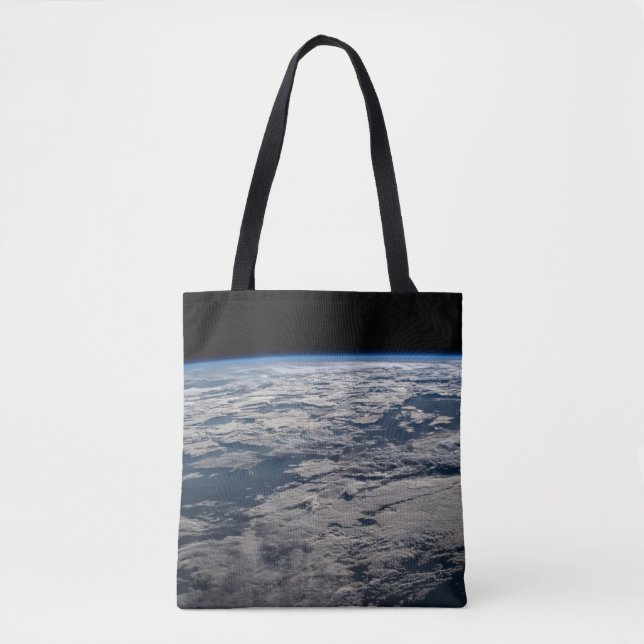 The Earth's Limb Above A Cloudy Western Australia. Tote Bag (Front)