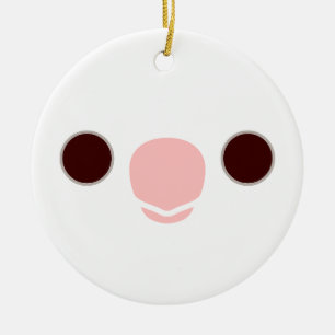 The face of a albino cockatiel ceramic tree decoration