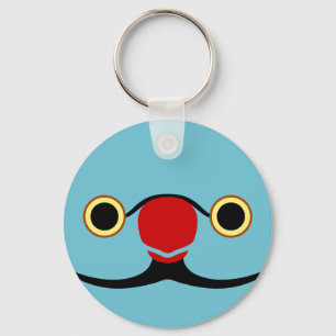 The face of a blue male Rose-ringed parakeet Key Ring