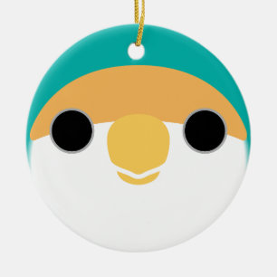 The face of a blue peach-faced lovebird ceramic tree decoration