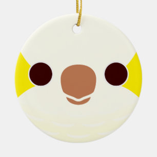The face of a Lutino Monk Parakeet Ceramic Tree Decoration