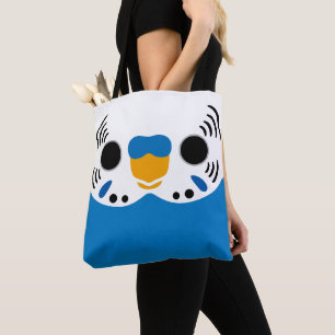 The face of a normal cobalt male budgie tote bag
