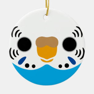 The face of a normal sky blue female budgie ceramic tree decoration