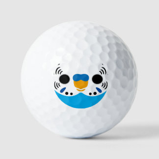 The face of a normal sky blue male budgie golf balls