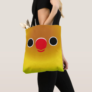 The face of a pastel green masked lovebird tote bag