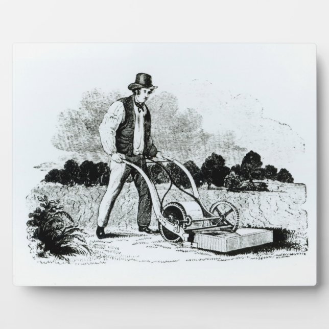 The first lawnmower (engraving) (b/w photo) plaque (Front)