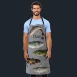 The Fisherman's Chef's & Husband w/ Name Apron<br><div class="desc">This adorable Apron can be used as a multitasking one. Just think, could be used for the Chef in the kitchen, an outdoors BBQ, Griller or could be used for the fisherman while cleaning his fish after a day on the ocean, lake or river. The background is a grey plywood...</div>