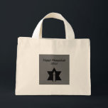 The Flame & Star - Mini Tote Bag<br><div class="desc">This image is a flame from a candle. A star around the flame represents Hanukkah. Done in a black tattoo. A black backround was also added. "Happy Hanukkah 2014" is printed on this design. Customise with your own words. These totes are available in assorted styles,  colours and sizes.</div>