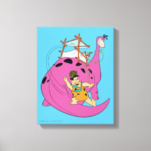 The Flintstones   Fred Sliding Down Tail Canvas Print