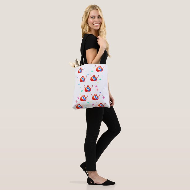 The Glitchy Stardust Monster Tote Bag (On Model)