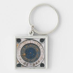 The gold and enamel clock face, design begun by Ma Key Ring