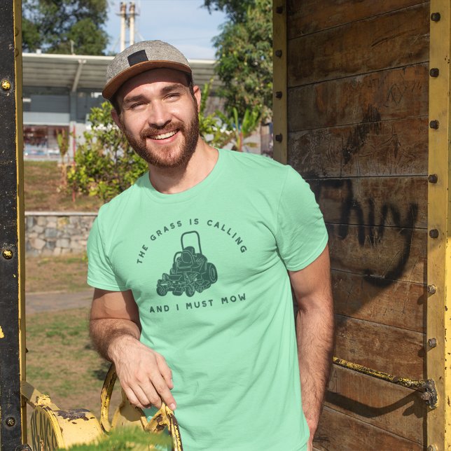 The Grass Is Calling and I Must Mow Funny Graphic Tri-Blend Shirt (Creator Uploaded)
