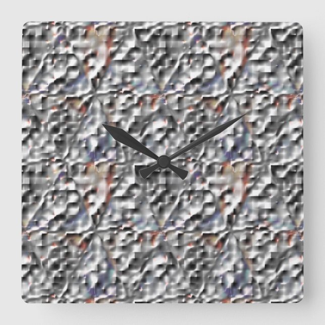 The grey hiding colour of square to triangle mosai wall clock (Front)