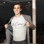 The Groom Personalised Chic Minimalist Wedding T-Shirt<br><div class="desc">This chic,  simple groom t-shirt features your name underneath elegant black typography reading The Groom. Customise these elegant,  modern bridal tees for your wedding events or bachelor party.</div>