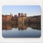 The Hague skyline in the Netherlands Mouse Mat<br><div class="desc">Mousepad with the modern skyline of the city centre of The Hague together with historic Mauritshuis museum and the seat of government Parliament building with reflection in the still water of Hofvijver lake at dusk in The Netherlands.</div>