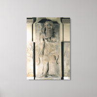 The hero Gilgamesh holding a lion