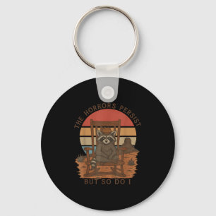 The Horrors Persist But So Do I Raccoon Cowboy  Key Ring