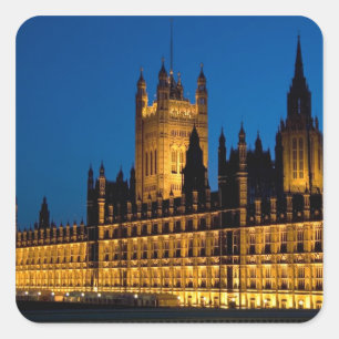 The Houses of Parliament at night in the city of Square Sticker