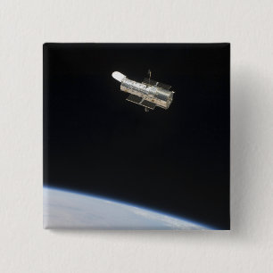 The Hubble Space Telescope in orbit above Earth 2 15 Cm Square Badge