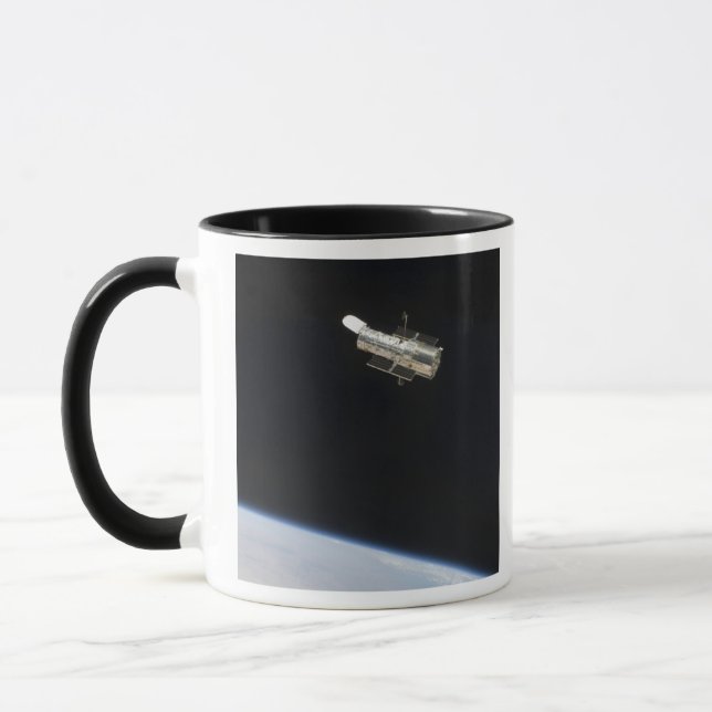 The Hubble Space Telescope in orbit above Earth 2 Mug (Left)