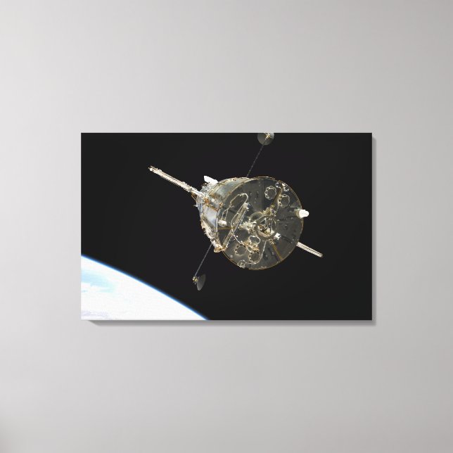 The Hubble Space Telescope in orbit above Earth Canvas Print (Front)