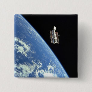 The Hubble Space Telescope with a blue earth 15 Cm Square Badge