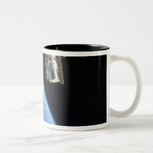 The Hubble Space Telescope with a blue earth Two-Tone Coffee Mug