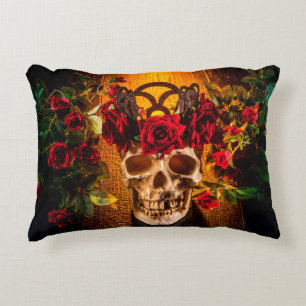 The human skull on the black table lies in the ros decorative cushion