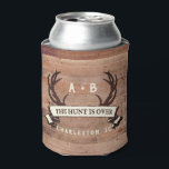 The Hunt's Over Custom Rustic Antler Wedding Favou Can Cooler<br><div class="desc">Custom Wedding Can Cooler, Wedding Favour - The Hunt is Over antlers banner design with personalised couple's initials, the bride and groom's names, wedding date, and location. To change the text, use the personalise option. For more extensive text changes such as changes to the font, font colour, or text size...</div>