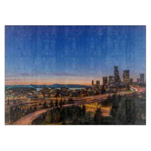 The I-5 freeway and downtown Seattle at twilight Cutting Board
