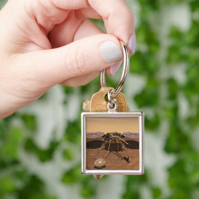 The Insight Lander Operating On Surface Of Mars. Key Ring (Hand)