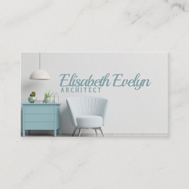 The interior has a armchair on empty white wall business card (Front)