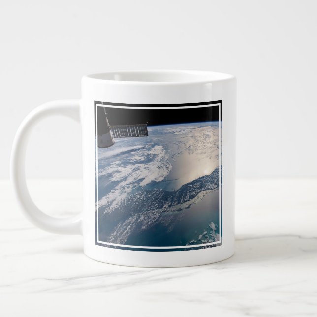 The International Spce Station Above The Atlantic Large Coffee Mug (Left)
