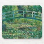 The Japanese Bridge (Water-Lily Pond), Monet Mouse Mat<br><div class="desc">Oscar-Claude Monet (14 November 1840 – 5 December 1926) was a French painter, a founder of French Impressionist painting and the most consistent and prolific practitioner of the movement's philosophy of expressing one's perceptions before nature, especially as applied to plein air landscape painting. The term ""Impressionism"" is derived from the...</div>
