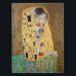 The Kiss by Gustav Klimt Notebook<br><div class="desc">The Kiss by Gustav Klimt The Kiss is an oil-on-canvas painting with added gold leaf, silver and platinum. by the Austrian Symbolist painter Gustav Klimt. It was painted at some point in 1907 and 1908, during the height of what scholars call his "Golden Period". Featuring shimmering gold tones, stylized forms,...</div>