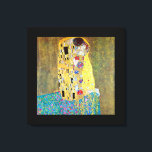 The Kiss by Gustav Klimt, Vintage Art Nouveau Canvas Print<br><div class="desc">The Kiss (Der Kuss) (1907/08) by Gustav Klimt is probably his most famous work. Klimt began work on it in 1907 and it is the highpoint of his so-called 'Golden Period'. The Kiss is a vintage Victorian Era Symbolism fine art love and romance painting featuring a romantic couple in various...</div>