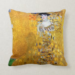 The Lady in Gold, Gustav Klimt Cushion<br><div class="desc">Gustav Klimt (July 14, 1862 – February 6, 1918) was an Austrian symbolist painter and one of the most prominent members of the Vienna Secession movement. Klimt is noted for his paintings, murals, sketches, and other objets d'art. Klimt's primary subject was the female body, and his works are marked by...</div>