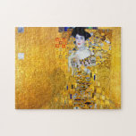 The Lady in Gold, Gustav Klimt Jigsaw Puzzle<br><div class="desc">Gustav Klimt (July 14, 1862 – February 6, 1918) was an Austrian symbolist painter and one of the most prominent members of the Vienna Secession movement. Klimt is noted for his paintings, murals, sketches, and other objets d'art. Klimt's primary subject was the female body, and his works are marked by...</div>