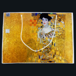 The Lady in Gold, Gustav Klimt Large Gift Bag<br><div class="desc">Gustav Klimt (July 14, 1862 – February 6, 1918) was an Austrian symbolist painter and one of the most prominent members of the Vienna Secession movement. Klimt is noted for his paintings, murals, sketches, and other objets d'art. Klimt's primary subject was the female body, and his works are marked by...</div>