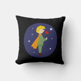 The little prince admiring his rose cushion
