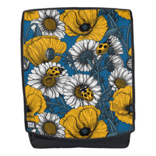 The meadow in yellow and blue backpack