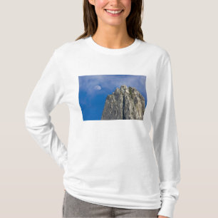 The moon rises and shines through the clouds T-Shirt