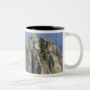 The moon rises and shines through the clouds Two-Tone coffee mug