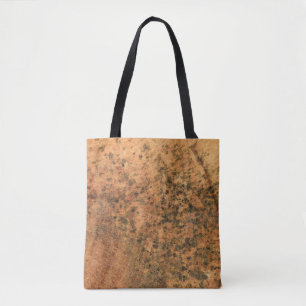 The mould that grows on the brown wood surface is tote bag